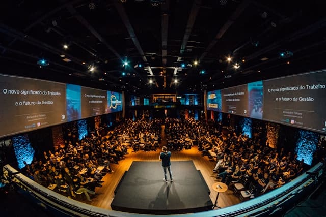 Professional speaker presenting at a live event